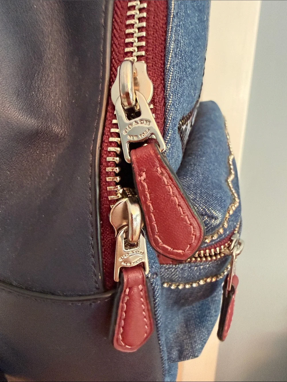 Authentic Coach Burgundy Leather/Denim mini backpack with patchwork/rhinestone